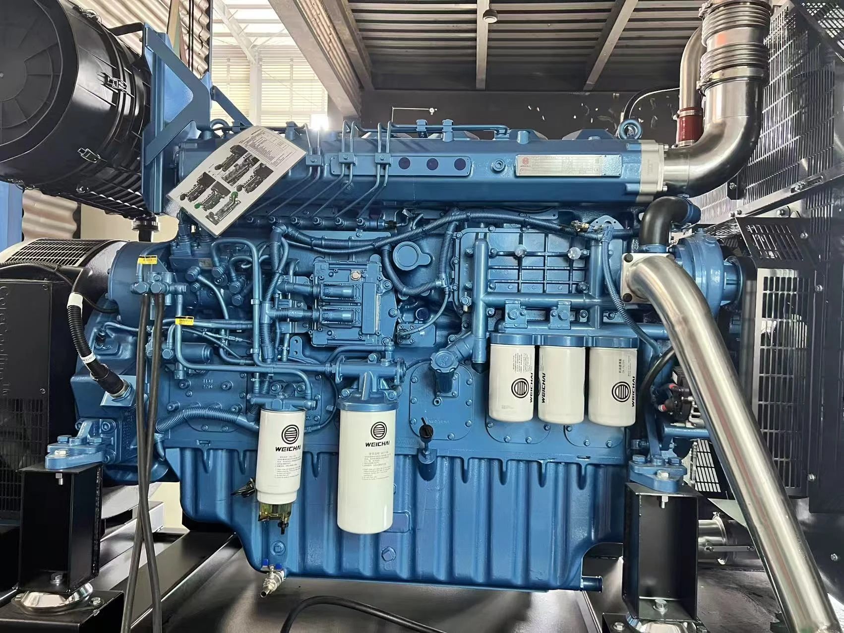 Weichai diesel engine with service filters and cooling connections